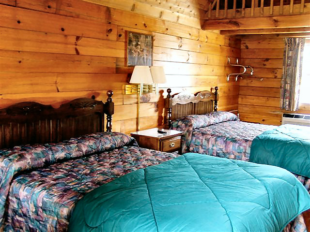 Big Cabin: Non-smoking, one room, 18 x 24, either two queen beds or three double beds,