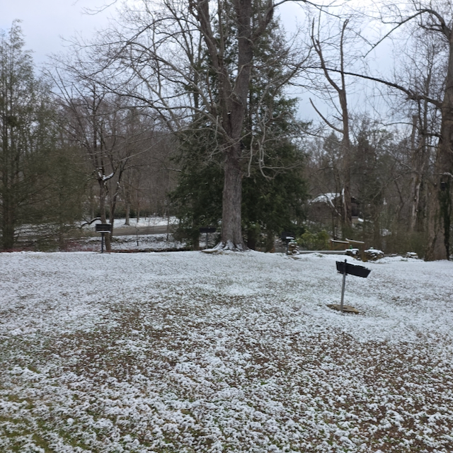 Grilling area at the pavilion with snow on the ground