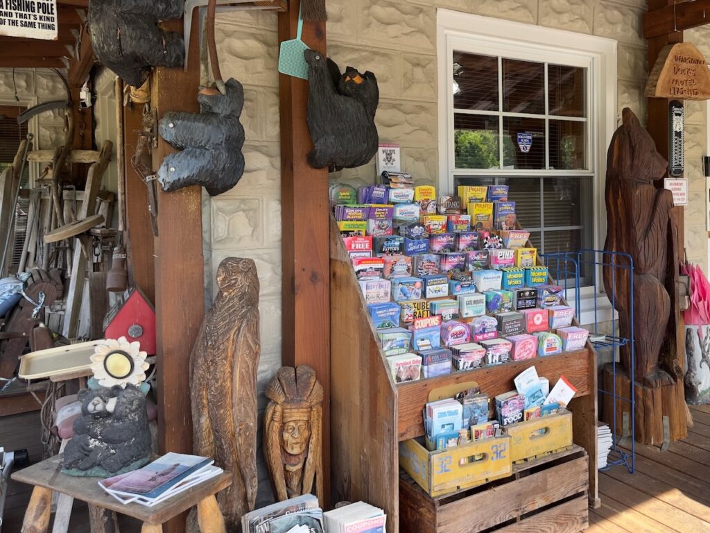 area brochures in a rack on the porch at Dock's Motel