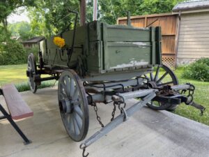 Old wagon sitting under the picnic pavillion