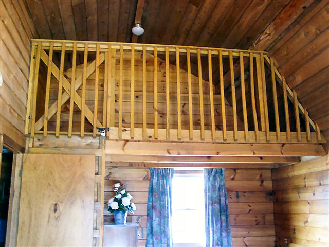 Big Cabin: loft with no bed, only children over the age of 10 are permitted to use the loft. We provide a sleep pallet or you can bring your own.