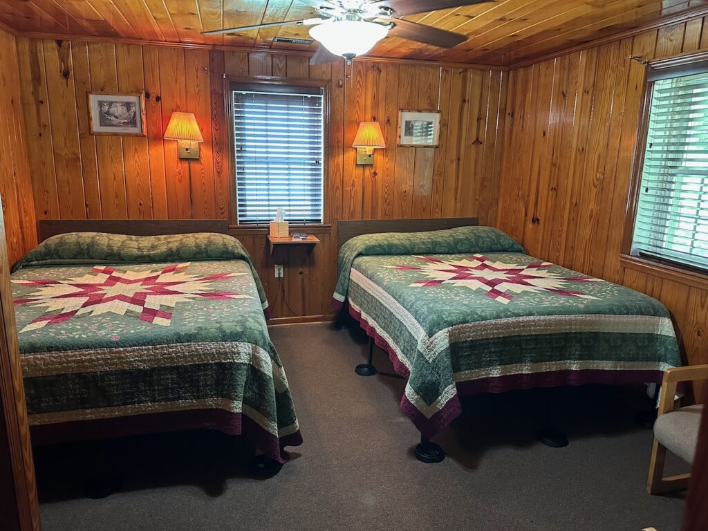 2nd bedroom of Heritage Cabin showing 2 double beds