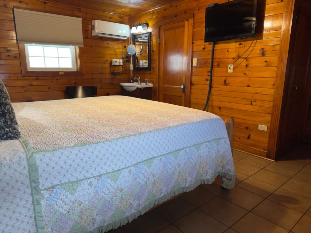pic king bed with vanity in the far corner