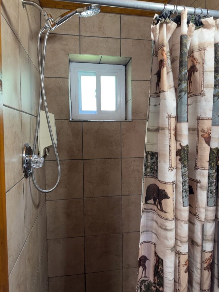 newly tiled step in shower at docks motel room 14