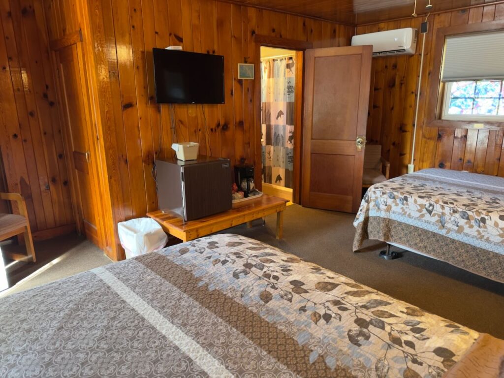 Standard room at Dock's Motel showing mini-fridge and coffee maker