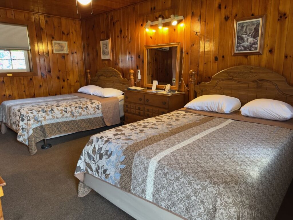 Motel Room with 2 queen beds and dresser