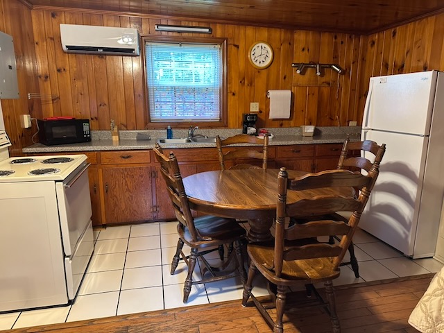 Full Kitchen with dining room table, stove, fridge, etc